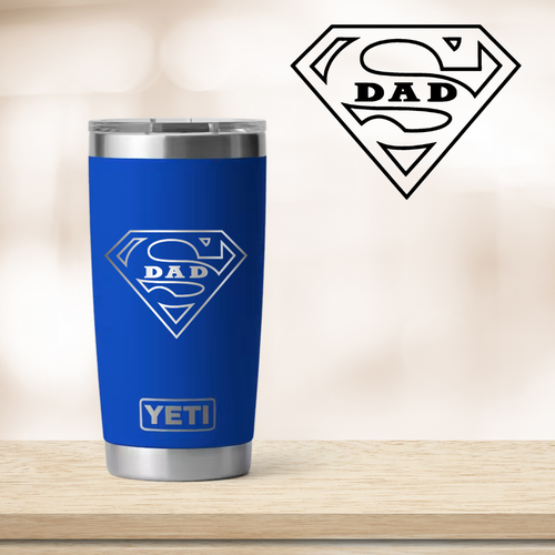 Blue YETI tumbler with 'Super Dad' design on a wooden surface
