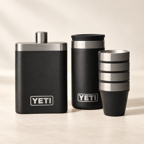 A Toast Together gift set with black flask and four stacked shot glasses with black carrying case