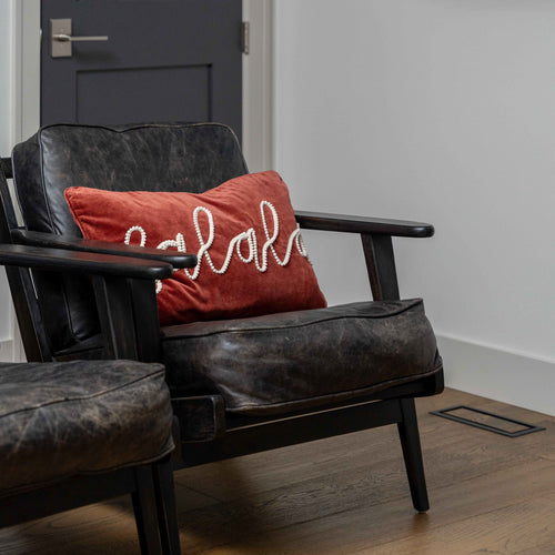 GP Home holiday styling: fa la la velvet pillow.