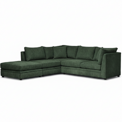 Green sectional sofa on a white background
